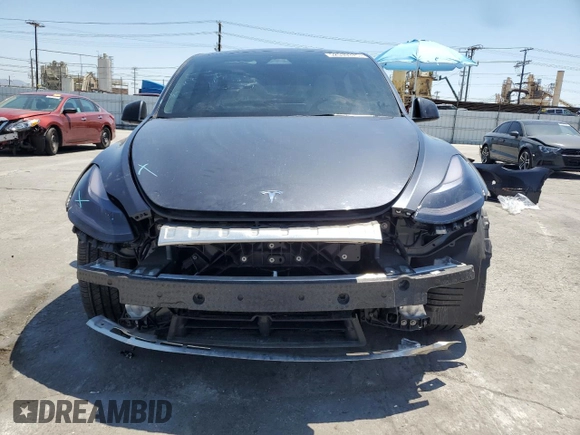2024 Tesla Model Y Long Range with VIN 7SAYGDEE6RA226035, listed as a Copart auction lot 52539375 with 14,220 mi miles and Salvage title. Bid and sale history available at DreamBid. Image 5.