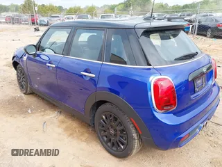2021 MINI Hardtop 4 Door Cooper S with VIN WMWXU9C00M2N60370, listed as a IAAI auction lot 42426257 with 11,288 mi miles and . Bid and sale history available at DreamBid. Image 3.