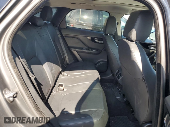 2018 Jaguar F-Pace 25t Premium with VIN SADCJ2FX6JA299858, listed as a Copart auction lot 59212765 with 74,971 mi miles and Salvage title. Bid and sale history available at DreamBid. Image 11.