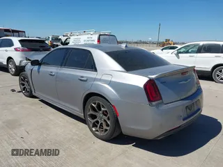 2018 Chrysler 300 with VIN 2C3CCABG2JH245095, listed as a IAAI auction lot 41827509 with 156,617 mi miles. Bid and sale history available at carsss.com. Image 3.