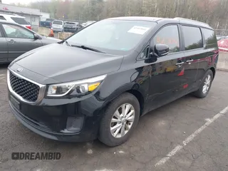 2016 Kia Sedona LX with VIN KNDMB5C1XG6171343, listed as a IAAI auction lot 42183042 with 87,740 mi miles. Bid and sale history available at carsss.com. Image 2.