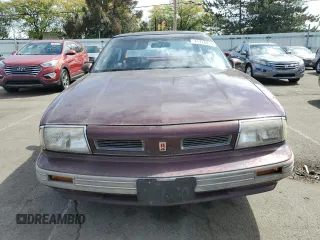 1992 Oldsmobile 88 z VIN 1G3HN53L6N1805364, wystawiony jako Copart lot #71710934 z przebiegiem 47 032 mil mil oraz Szkoda całkowita • Salvage title. Historia ofert i sprzedaży dostępna na DreamBid. Obrazek 5.