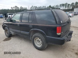 1999 Chevrolet Blazer LS z VIN 1GNCS13W0X2133425, wystawiony jako Copart lot #81930324 z przebiegiem 224 669 mil mil oraz Szkoda całkowita • Salvage title. Historia ofert i sprzedaży dostępna na DreamBid. Obrazek 2.