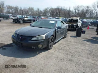 2008 Pontiac Grand Prix z VIN 2G2WP552281113384, wystawiony jako IAAI lot #41989008 z przebiegiem 242 354 mil mil oraz . Historia ofert i sprzedaży dostępna na DreamBid. Obrazek 17.