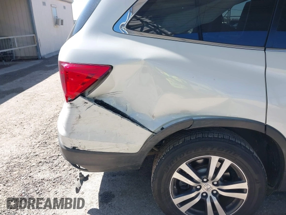 2018 Honda Pilot EX-L with VIN 5FNYF5H54JB009785, listed as a IAAI auction lot 41667784 with 67,296 mi miles. Bid and sale history available at carsss.com. Image 6.