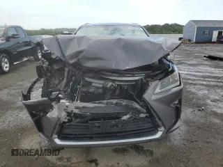 2016 Lexus RX 350 z VIN 2T2BZMCA1GC010235, wystawiony jako Copart lot #62363585 z przebiegiem Nie podano mil oraz Szkoda całkowita • Salvage title. Historia ofert i sprzedaży dostępna na DreamBid. Obrazek 5.