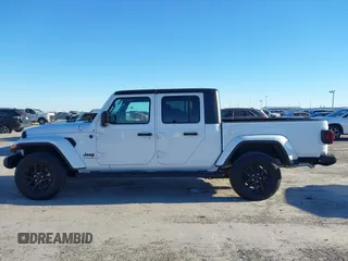 2023 Jeep Gladiator Willys z VIN 1C6HJTAGXPL528674, wystawiony jako IAAI lot #41376339 z przebiegiem 7 102 mil mil oraz . Historia ofert i sprzedaży dostępna na DreamBid. Obrazek 14.