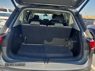 2024 Volkswagen Tiguan SE with VIN 3VV3B7AX1RM108036, listed as a IAAI auction lot 42796415 with 37,805 mi miles and . Bid and sale history available at DreamBid. Image 4.