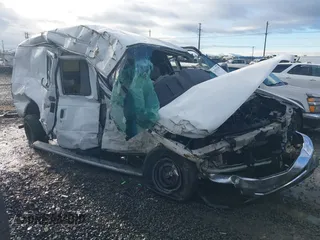2010 Ford Econoline Cargo Commercial z VIN 1FTNE2EW6ADA24796, wystawiony jako IAAI lot #38355550 z przebiegiem Nie podano mil oraz . Historia ofert i sprzedaży dostępna na DreamBid. Obrazek 1.
