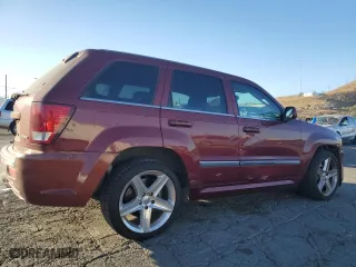 2007 Jeep Grand Cherokee SRT-8 with VIN 1J8HR78337C662589, listed as a Copart auction lot 81880564 with 257,953 mi miles and Salvage Title. Bid and sale history available at carsss.com. Image 3.