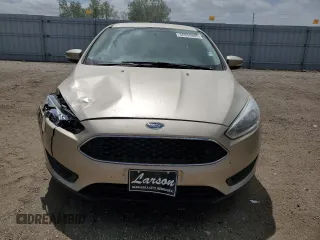 2017 Ford Focus SE with VIN 1FADP3F28HL299535, listed as a Copart auction lot 56958885 with 102,179 mi miles and Clean title. Bid and sale history available at DreamBid. Image 5.