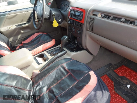 2001 Jeep Grand Cherokee Laredo with VIN 1J4GX48SX1C522670, listed as a IAAI auction lot 42111708 with Not provided miles and . Bid and sale history available at DreamBid. Image 5.