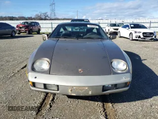 1984 Porsche 928 z VIN WP0JB0920ES860222, wystawiony jako Copart lot #44055645 z przebiegiem 166 689 mil mil oraz Nie do naprawy. Historia ofert i sprzedaży dostępna na DreamBid. Obrazek 5.