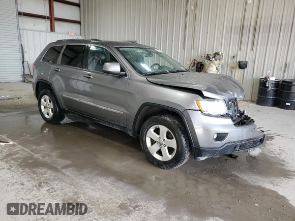 2013 Jeep Grand Cherokee Laredo with VIN 1C4RJFAG3DC612250, listed as a Copart auction lot 53155455 with 157,895 mi miles and Salvage Title. Bid and sale history available at carsss.com. Image 4.