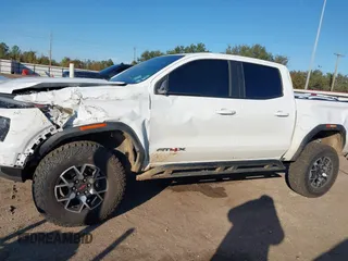 2023 GMC Canyon 4WD AT4X with VIN 1GTP6EEK4P1199532, listed as a IAAI auction lot 41027695 with 1 mi miles. Bid and sale history available at carsss.com. Image 13.