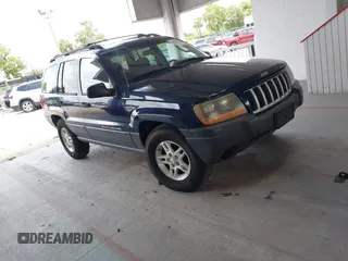 2004 Jeep Grand Cherokee Laredo z VIN 1J4GW48S64C208294, wystawiony jako IAAI lot #42491437 z przebiegiem 233 725 mil mil oraz . Historia ofert i sprzedaży dostępna na DreamBid. Obrazek 1.