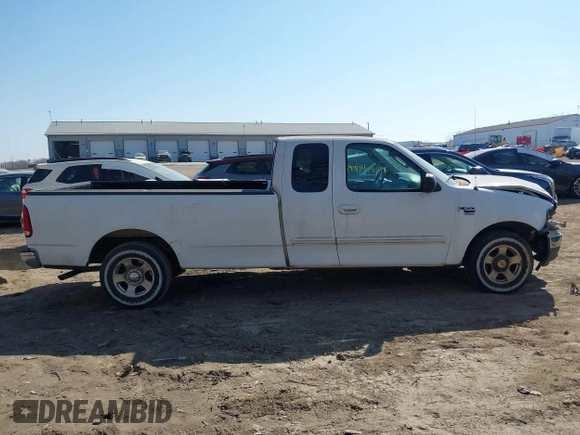 2003 Ford F-150 with VIN 2FTRX17L63CA31923, listed as a IAAI auction lot 41778818 with 107,600 mi miles and . Bid and sale history available at DreamBid. Image 13.
