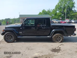 2020 Jeep Gladiator Overland with VIN 1C6HJTFG8LL176164, listed as a IAAI auction lot 42482369 with 80,009 mi miles and . Bid and sale history available at DreamBid. Image 14.