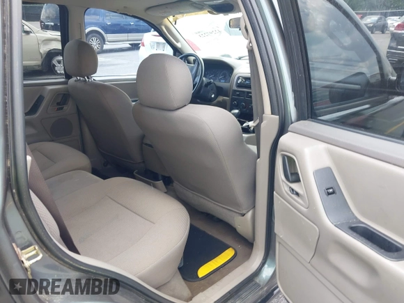 2002 Jeep Grand Cherokee Laredo with VIN 1J4GX48S42C313801, listed as a IAAI auction lot 42297223 with 153,633 mi miles and . Bid and sale history available at DreamBid. Image 8.