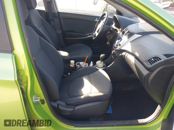 2014 Hyundai Accent SE z VIN KMHCU5AEXEU175389, wystawiony jako IAAI lot #42067176 z przebiegiem 124 741 mil mil oraz . Historia ofert i sprzedaży dostępna na DreamBid. Obrazek 5.