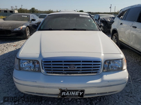 2004 Ford Crown Victoria LX z VIN 2FDFP74W34X164453, wystawiony jako Copart lot #75922204 z przebiegiem 103 546 mil mil oraz Szkoda całkowita • Salvage title. Historia ofert i sprzedaży dostępna na DreamBid. Obrazek 5.