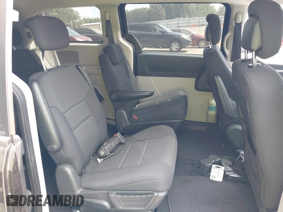2010 Dodge Grand Caravan SE with VIN 2D4RN4DE2AR339889, listed as a IAAI auction lot 40034624 with 104,896 mi miles and . Bid and sale history available at DreamBid. Image 8.