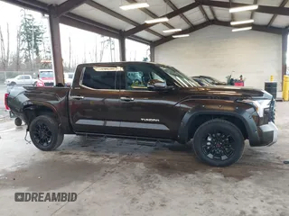 2023 Toyota Tundra Limited with VIN 5TFJA5DB9PX125400, listed as a IAAI auction lot 41336129 with 12,384 mi miles and . Bid and sale history available at DreamBid. Image 14.