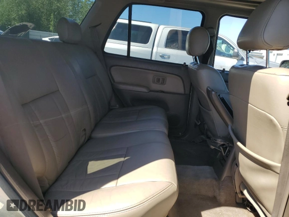 1999 Toyota 4Runner Limited z VIN JT3HN87R1X9024311, wystawiony jako Copart lot #55877715 z przebiegiem 288 859 mil mil oraz Czysty tytuł • Clean title. Historia ofert i sprzedaży dostępna na DreamBid. Obrazek 11.