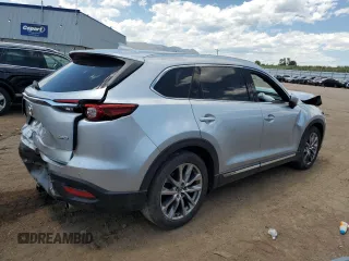 2016 Mazda CX-9 Grand Touring с VIN JM3TCADY2G0121026, выставлен на аукционе Copart как лот 60518105 с пробегом 104 923 миль миль и Списание • Salvage title. История ставок и продаж доступна на DreamBid. Изображение 3.