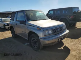 1995 Chevrolet Tracker z VIN 2CNBJ186XS6926688, wystawiony jako Copart lot #77487204 z przebiegiem 17 598 mil mil oraz Szkoda całkowita • Salvage title. Historia ofert i sprzedaży dostępna na DreamBid. Obrazek 4.