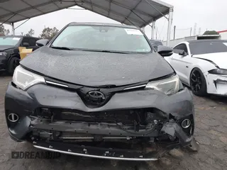 2018 Toyota RAV4 XLE z VIN JTMWFREV4JJ188776, wystawiony jako IAAI lot #41525603 z przebiegiem 110 743 mil mil oraz . Historia ofert i sprzedaży dostępna na DreamBid. Obrazek 12.