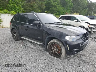 2013 BMW X5 xDrive50i with VIN 5UXZV8C55DL899584, listed as a Copart auction lot 54257745 with 111,367 mi miles and Clean title. Bid and sale history available at DreamBid. Image 4.