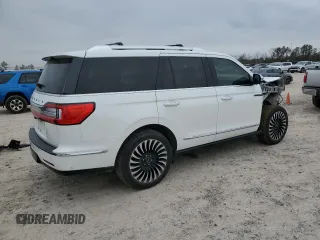 2020 Lincoln Navigator Black Label with VIN 5LMJJ2TT7LEL19771, listed as a Copart auction lot 46167285 with 99,753 mi miles and Salvage title. Bid and sale history available at DreamBid. Image 3.