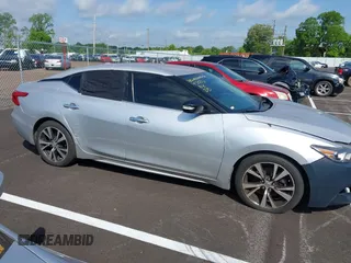 2017 Nissan Maxima SR с VIN 1N4AA6APXHC426651, выставлен на аукционе IAAI как лот 42242002 с пробегом 155 824 миль миль и . История ставок и продаж доступна на DreamBid. Изображение 13.