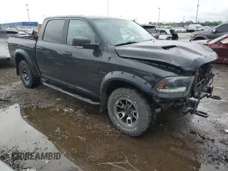2015 Ram 1500 Rebel with VIN 1C6RR7YT8FS743062, listed as a Copart auction lot 61678185 with 130,997 mi miles and Clean title. Bid and sale history available at DreamBid. Image 4.