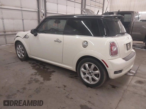 2010 MINI Hardtop S with VIN WMWMF7C50ATZ71884, listed as a IAAI auction lot 41731490 with 55,864 mi miles and . Bid and sale history available at DreamBid. Image 3.