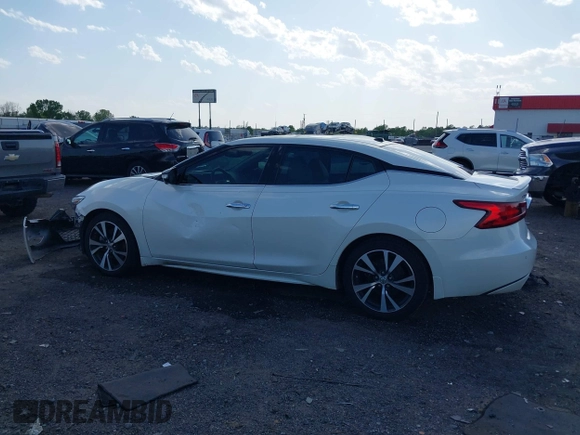 2016 Nissan Maxima SV z VIN 1N4AA6AP9GC431466, wystawiony jako IAAI lot #42007934 z przebiegiem 263 333 mil mil oraz . Historia ofert i sprzedaży dostępna na DreamBid. Obrazek 14.