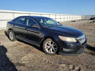 2011 Ford Taurus SEL with VIN 1FAHP2EWXBG164007, listed as a Copart auction lot 50176575 with 257,154 mi miles and Salvage Title. Bid and sale history available at carsss.com. Image 4.
