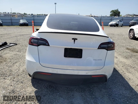 2022 Tesla Model Y Long Range z VIN 7SAYGAEE6NF492070, wystawiony jako Copart lot #52032415 z przebiegiem 143 732 mil mil oraz Szkody całkowita. Historia ofert i sprzedaży dostępna na DreamBid. Obrazek 6.