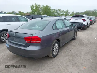 2014 Volkswagen Passat Wolfsburg Edition with VIN 1VWAT7A37EC102282, listed as a IAAI auction lot 42310561 with 113,374 mi miles and . Bid and sale history available at DreamBid. Image 4.