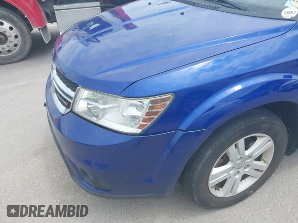 2012 Dodge Journey SXT with VIN 3C4PDCBB0CT323362, listed as a IAAI auction lot 42528338 with 187,995 mi miles and . Bid and sale history available at DreamBid. Image 6.