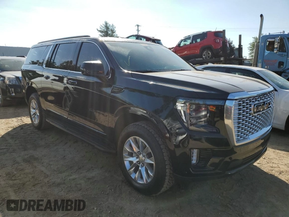 2023 GMC Yukon XL Denali with VIN 1GKS2JKL8PR328342, listed as a Copart auction lot 63427453 with 6,753 mi miles and Salvage Title. Bid and sale history available at carsss.com. Image 4.