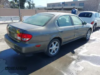 2003 Infiniti I35 Luxury with VIN JNKDA31A23T104434, listed as a IAAI auction lot 41821043 with 146,903 mi miles. Bid and sale history available at carsss.com. Image 4.