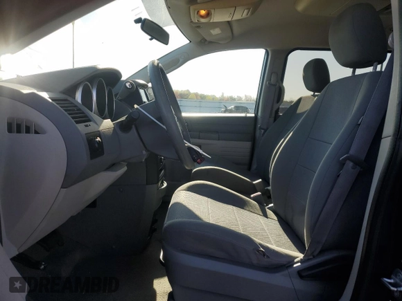 2009 Dodge Grand Caravan SE z VIN 1D8HN44E09B512488, wystawiony jako Copart lot #51506045 z przebiegiem 111 604 mil mil oraz Szkoda całkowita • Salvage title. Historia ofert i sprzedaży dostępna na DreamBid. Obrazek 7.