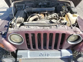 2002 Jeep Wrangler Sahara with VIN 1J4FA59S72P706380, listed as a Copart auction lot 56365355 with 282,467 mi miles and Clean title. Bid and sale history available at DreamBid. Image 12.