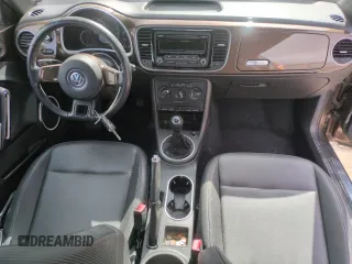 2013 Volkswagen Beetle with VIN 3VWHX7AT8DM603424, listed as a Copart auction lot 51019185 with 136,196 mi miles and Salvage Title. Bid and sale history available at DreamBid. Image 8.