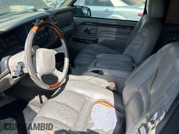 1999 Cadillac Escalade с VIN 1GYEK13R7XR408723, выставлен на аукционе IAAI как лот 42440305 с пробегом 173 754 миль миль и . История ставок и продаж доступна на DreamBid. Изображение 5.