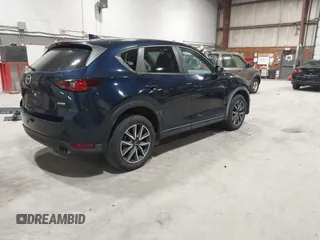 2018 Mazda CX-5 Touring with VIN JM3KFBCM5J0434716, listed as a IAAI auction lot 41738956 with 108,264 mi miles and . Bid and sale history available at DreamBid. Image 4.