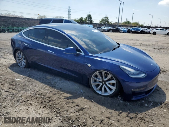 2020 Tesla Model 3 Long Range with VIN 5YJ3E1EB4LF744575, listed as a Copart auction lot 50202375 with 61,357 mi miles and Salvage Title. Bid and sale history available at carsss.com. Image 4.