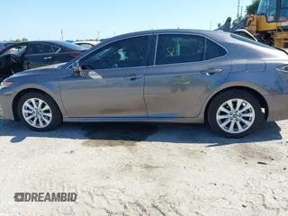 2019 Toyota Camry LE with VIN 4T1B11HK4KU286959, listed as a IAAI auction lot 42063344 with 92,481 mi miles and . Bid and sale history available at DreamBid. Image 14.
